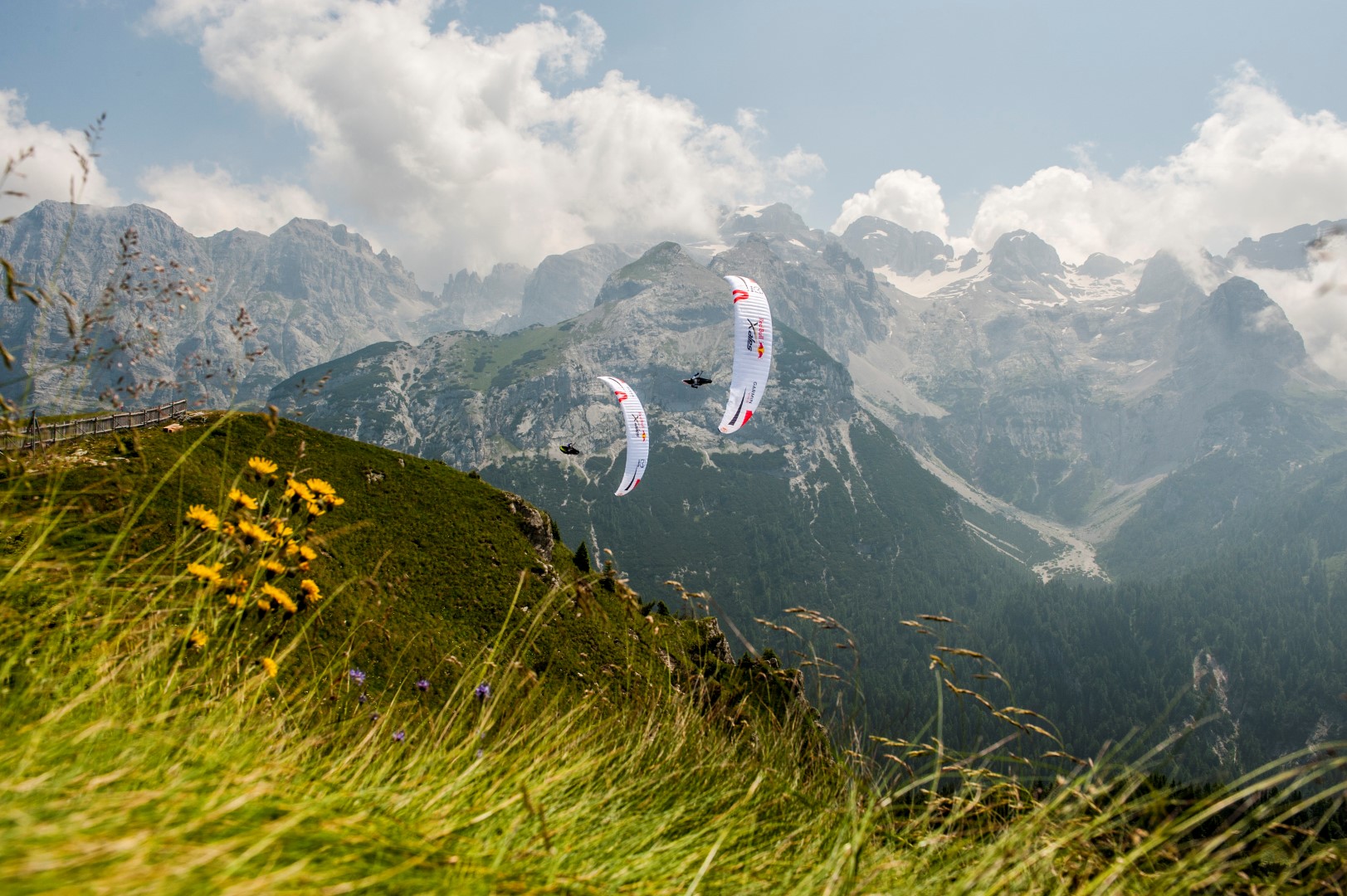 Participants perform during the Red Bull X-Alps at Brenta, Italy on July 7th 2015